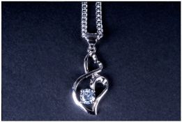 Modern Silver Pendant And Chain Stylised Heart Shape Pendant Set With A CZ Stone, Suspended On A