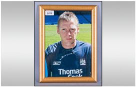 Stuart Pearce Signed and framed photograph of Stuart in his Manchester City days together with a