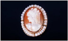 Cameo Brooch, profile of a young woman facing right. Set in a 9ct gold frame with bead border. Fully