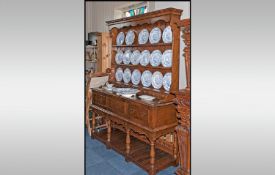 Large Oak Dresser & Rack Of Fine Heavy Quality with a shaped cornice above three shelves, with a