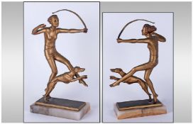 Art Deco Fine Quality Spelter Figure in the form of a semi-naked woman huntress with bow & dog  in