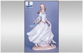 Lladro Figure 'Cinderella' model number 4828, issued 1972. 9.75" in height. Mint condition.