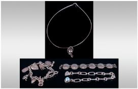 Collection Of Silver Comprising Charm Bracelet, Open Link Bracelet, Coin Bracelet And A Pendant &