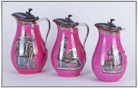 Set of Three Pratt Style Graduated Jugs, each with an attached pewter lid and with printed classical