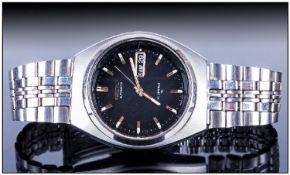 Gents Seiko Automatic Wristwatch black dial with gilt batons and daydate aperture, stainless steel