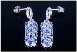 Tanzanite Cluster Drop Earrings, in an Art Deco style; each drop comprising three vertical rows of