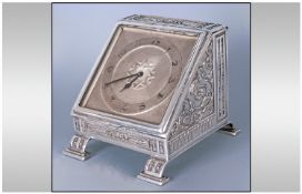 French Silver Plated 8 Day Top Quality Ornate Cased And Silver Dial Desk Clock, with lift up