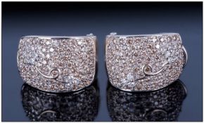 14ct Gold Diamond Earrings Each Set With Round Brilliant Cut Pave Set Diamonds And Raised Stylised