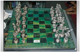Chess Set, comprising chess board and metal Chess pieces ( 2 figures need attention ).