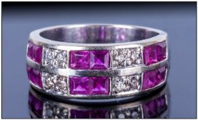 14ct White Gold Dress Ring Set With 2 Rows Of Alternating Calibre Cut Rubies And Round Cut Diamonds,