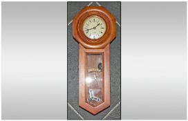 Reproduction Walnut Case Clock,  31 Day regulator key wind. Painted dial, Roman numerals.