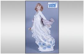 Lladro Figure 'Spring Splendor' Model number 5898, issued 1992. 11.75" in height. Mint condition.