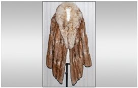 Ladies Three Quarter Length Coney Coat with fox fur collar. Fully lined. Slight scalloped edging.