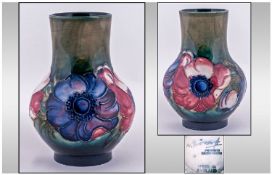 W.Moorcroft Bulbous Shaped Vase 'Anemone' Design On green/blue ground. Circa 1970's. 5" in height.