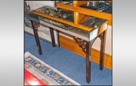 Contemporary Glass Mirrored Console Table with bronzed effect decoration. 31" in height, 40" in