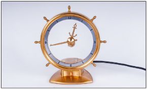 Jefferson Golden Helm Electric Clock, circa 1950. Features 24ct Gold plated on die cast Zinc base