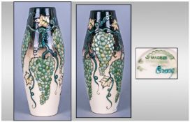 Moorcroft Modern Vase 'Quissac Grapes' Pattern Date 2000. Designer Nicola Slaney. 8.25" in height.