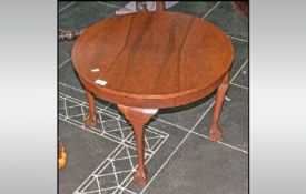 Small Rosewood Circular Coffee Table raised on cabriole legs and with ball and claw feet. 24