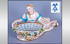 John Bevington Figural Sweetmeat Dish, after Meissen, showing a semi-clad female figure reclining on