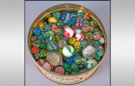 Antique Glass Marbles Approximately 250, various sizes & coloures. In a round tin.