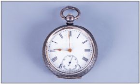 Swiss Ornate Silver Cased Open Faced Pocket Watch with white porcelain dial. Marked 935. Working