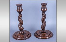 Pair of Barley Twist Wood Candlesticks. 8.5 inches in height.