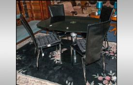 Contemporary Black Dining Suite with Polished Glass on Chrome Circular Base with Four Matching Black