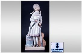 Lladro Figure 'Viola Lesson' model number 4842. 12" in height. Excellent condition but bow in two