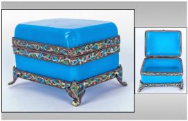 Chinese Opaque Turquoise Lidded Jewellery Box the metal frame picked out in coloured enamels.