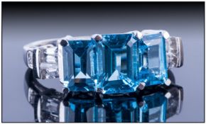 Swiss Blue Topaz and White Topaz Ring, the largest of the octagon cut blue topaz stones measuring