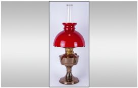 Early 20th Century Brass and Glass Oil Lamp. With red coloured shade.