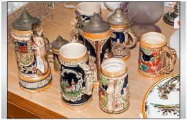 Collection of German Stein Tankards (8) in total.