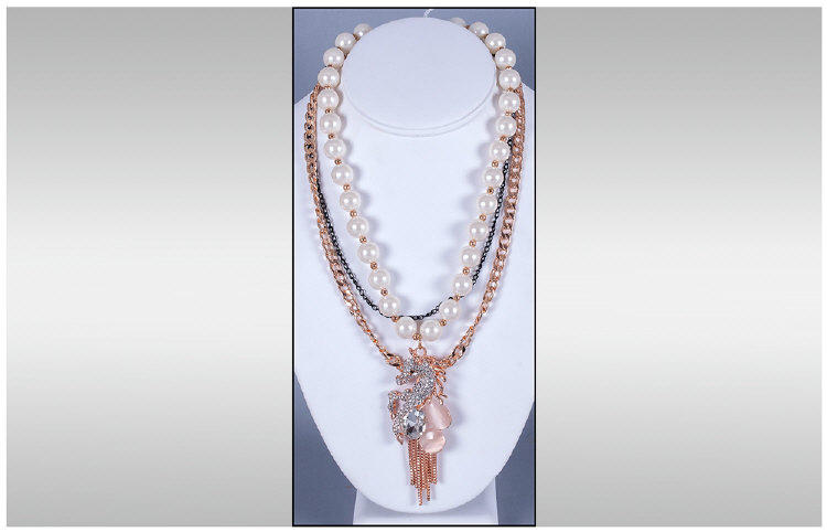 Horse Head Pendant Statement Necklace, the horse studded with white Austrian crystals above an