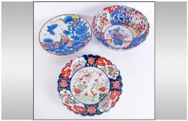 Three Japanese Pottery Items consisting of an Imari fruit bowl, late 19thC 10 inches diameter and