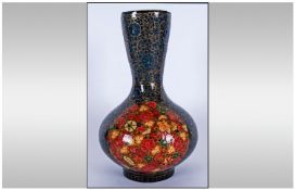 Lacquered Kashmir Bulbous Vase, decorated with red & yellow floral design. 8.5" in height.