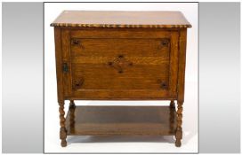 Oak Sideboard with Single Front Opening. Storage Shelf Below, pie crust borders and Barley Twist