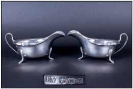 E Viner Pair Of Silver Sauce Boats, Hallmark Sheffield 1940. Each 3" in height, 6" in diameter.