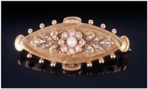 Victorian Gold and Seed Pearl Brooch, the gold of marquise shape with curved pieces to ends and