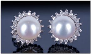 9ct White Gold Diamond And Pearl Stud Earrings, Each with Central Pearl Surrounded By Round Cut