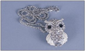 Enamel and Crystal Owl Pendant on long popcorn chain, the cute, stylised owl with cream enamelled