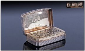 A George IV Silver Vinaigrette, engine turned with a clear cartouche, the inside containing a hinged