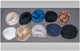 A collection of ten ladies hats, all a mixture of texture and colour to include some faux fur.