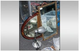 Gilt Rectangular Framed Mirror with a bevelled edge 13 by 25 inches. Together with a mahogany oval