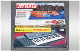 YAMAHA keyboard together with a yet gale radio controlled boat