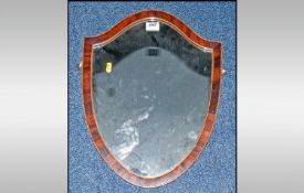 18th/19th Century Mahogany Shield Shaped Mirror, with satin wood stringing to edge. 20x15"
