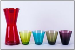 Coloured Glass Decanter Set and Four glasses.