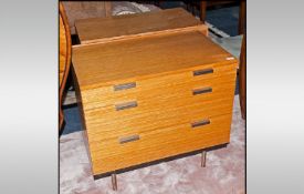 Matched Pair Of 1960's Stag Designer Chest Of Drawers, in a teak finish with alloy pull handles