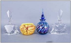 Miscellaneous Lot Comprising Two Clear Cut Glass Art Deco Scent Bottles, with prism stoppers.