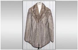 Silver Mink Ladies Jacket, fully lined. Size 12. Slit pockets. Hook & loop fastenings. Strips in a