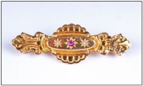 Late 19th Century Pressed Brooch Set With A Central Ruby And Two Diamond Chips, Hallmark Rubbed